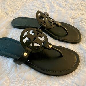 Tory Burch MILLER SANDAL in black with gold hardware.